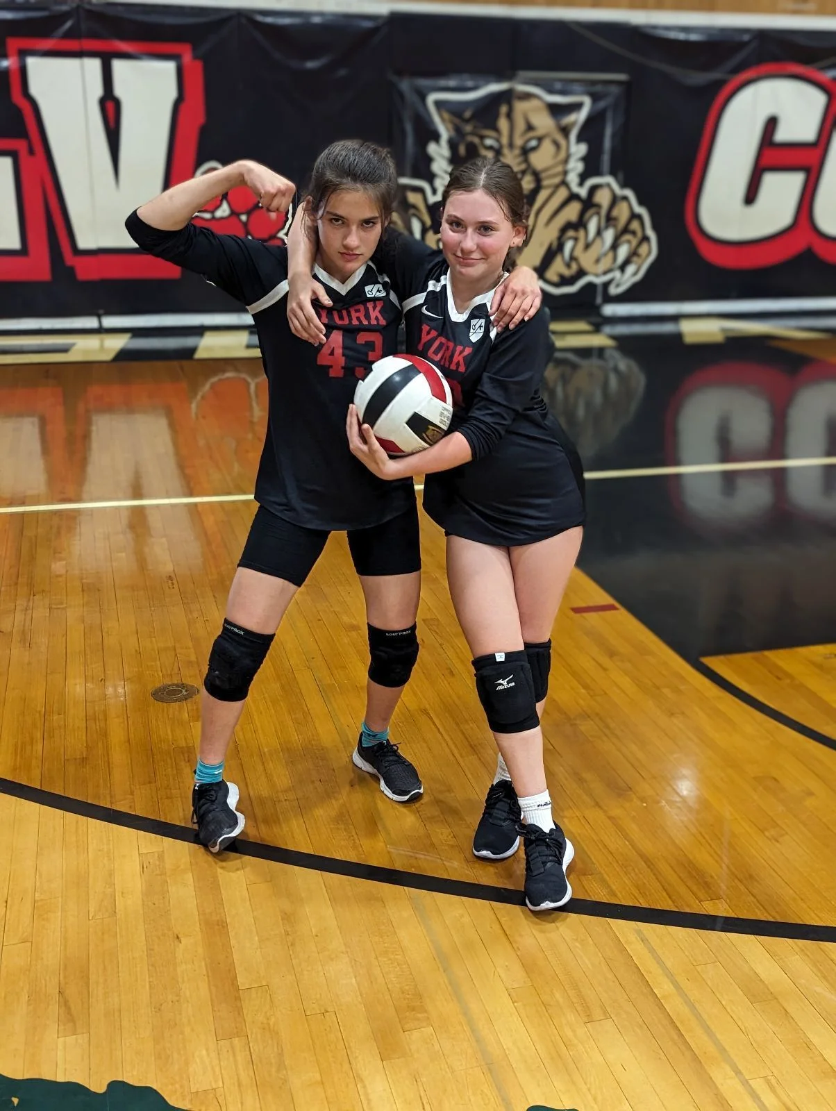 2 girls volleyball players