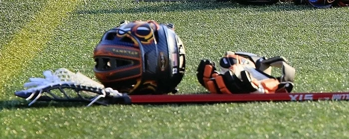 lacrosse gear on field